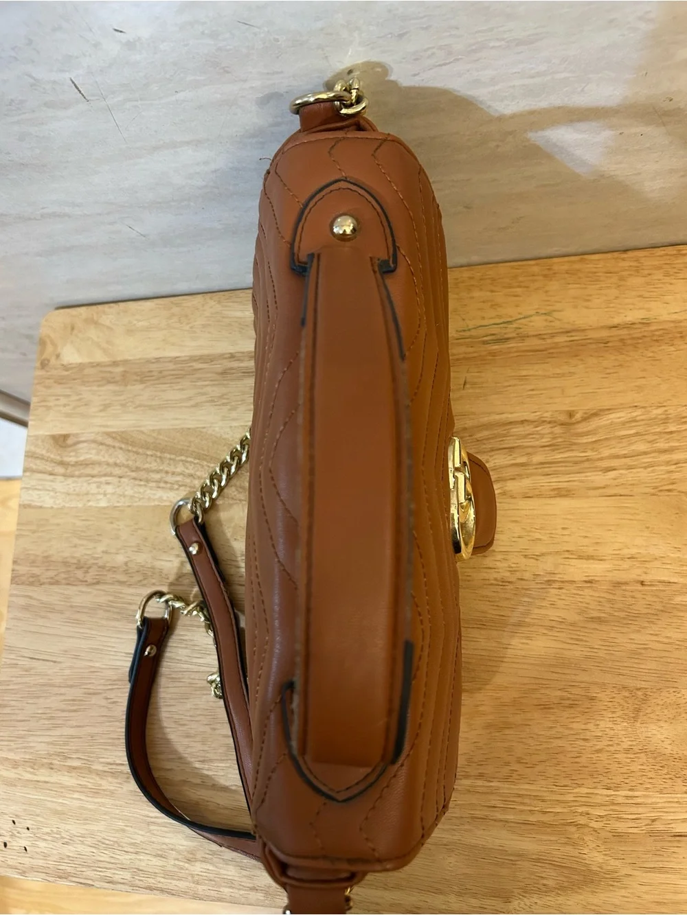 Designer Inspired brown quilted handbag featuring an interlocking double-G logo